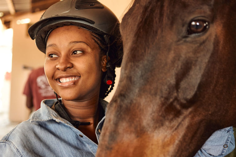 African-American-girl-withhorse-iStock-Magnifical-Productions-1289176673-1000