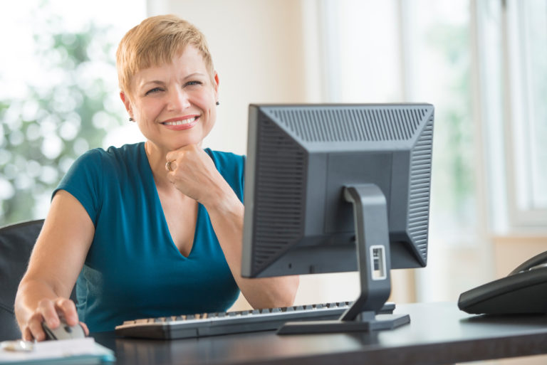 computer-woman-smiling-iStock-179567253-2400