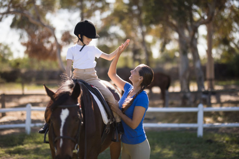lesson-riding-girl-woman-horse-happy-iStock-837983142-2400