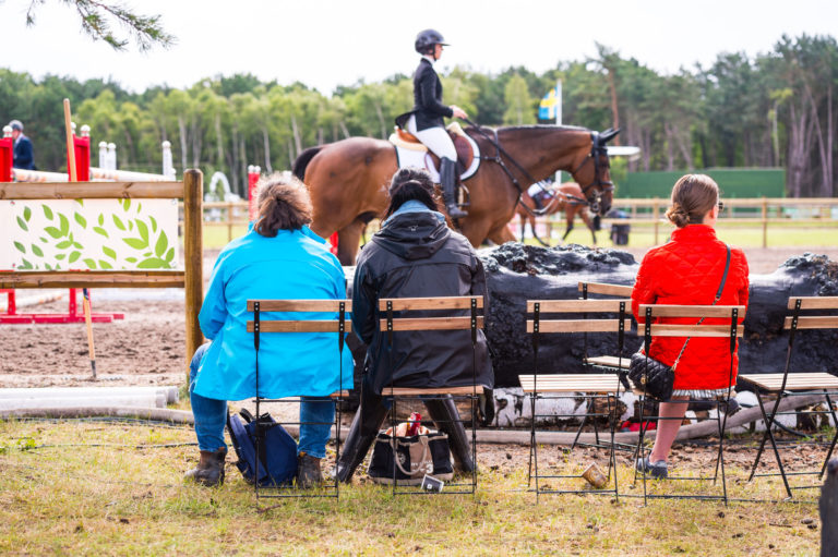 spectator-watching-horse-riding-chairs-iStock-583811346-2400
