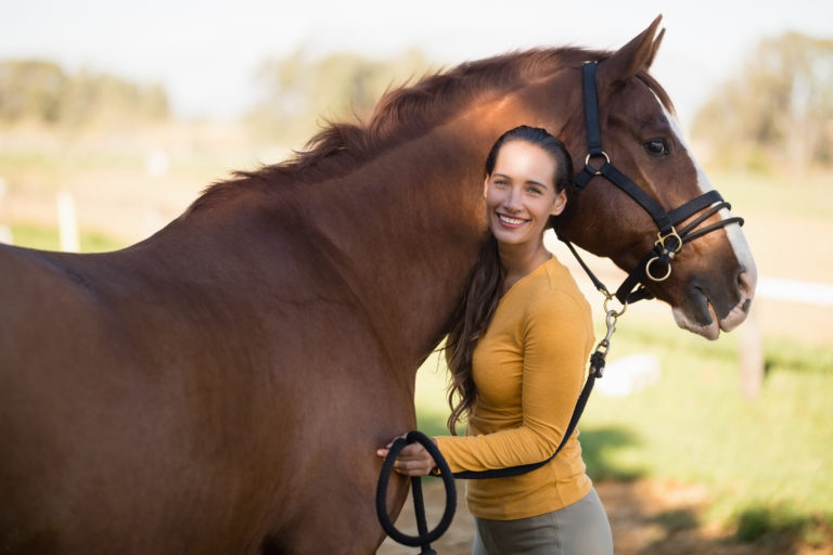 woman-young-with-horse-outside-iStock-838082342-2400